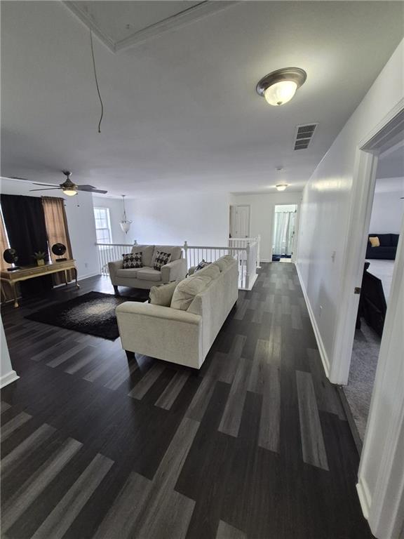 2689 Muskeg Court Southwest Atlanta, GA 30331 - Photo 12 of 35 a living room with furniture and a wooden floor