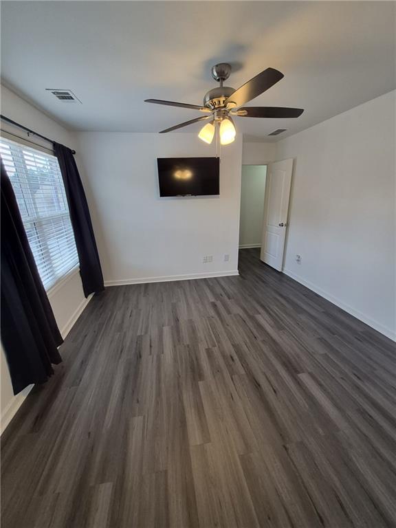 2689 Muskeg Court Southwest Atlanta, GA 30331 - Photo 15 of 35 wooden floor in an empty room with a window