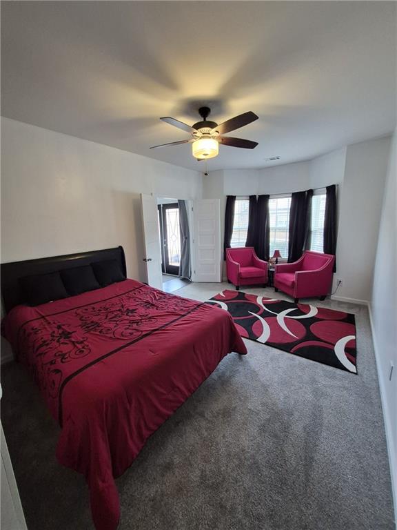 2689 Muskeg Court Southwest Atlanta, GA 30331 - Photo 20 of 35 a bedroom with bed and window