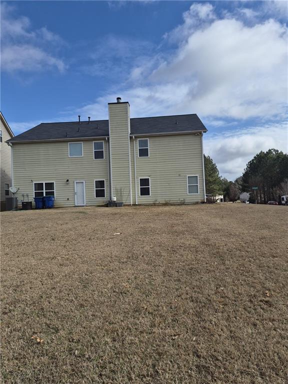 2689 Muskeg Court Southwest Atlanta, GA 30331 - Photo 2 of 35 a view of a house with a yard