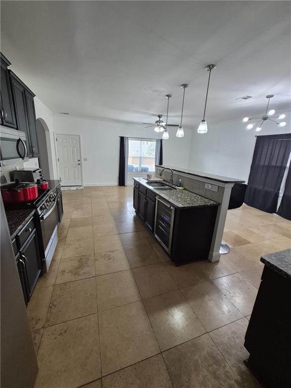 2689 Muskeg Court Southwest Atlanta, GA 30331 - Photo 27 of 35 a kitchen with stainless steel appliances granite countertop a sink and a stove