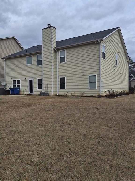 2689 Muskeg Court Southwest Atlanta, GA 30331 - Photo 32 of 35 a front view of house with yard