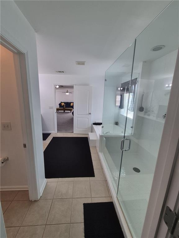 2689 Muskeg Court Southwest Atlanta, GA 30331 - Photo 7 of 35 a bathroom with a sink a toilet and shower