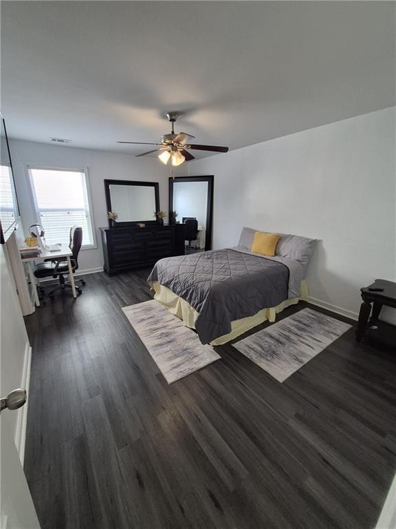 2689 Muskeg Court Southwest Atlanta, GA 30331 - Photo 10 of 35 a living room with furniture and a chandelier