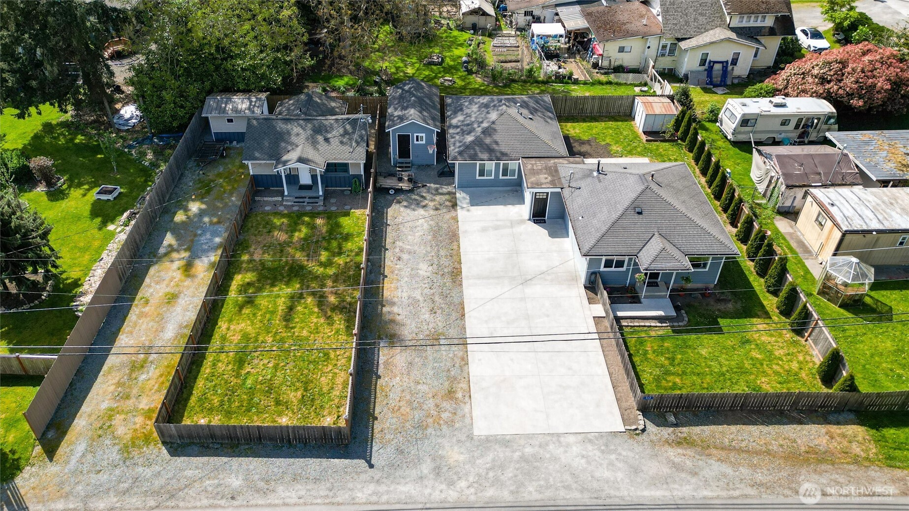 113 South Gardner Road Burlington, WA 98233 - Photo 2 of 40 an aerial view of residential house with swimming pool