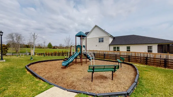 an aerial view of a house having swimming pool