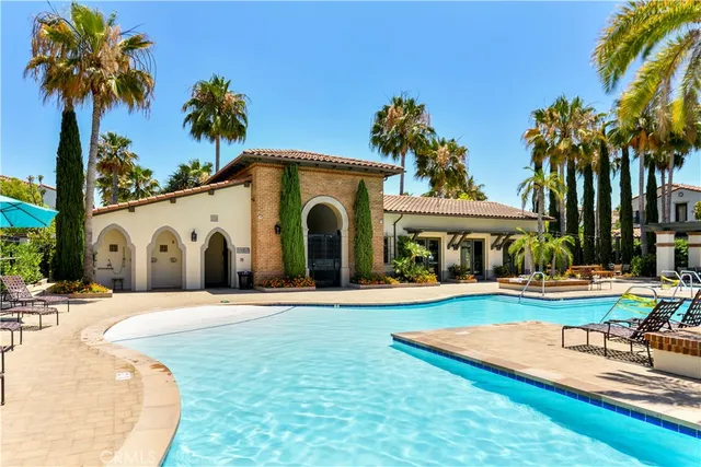 a front view of a house with garden and porch