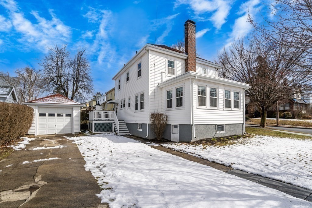 129 Standish Road Watertown, MA 02472 - Photo 15 of 17 a view of a house with a yard
