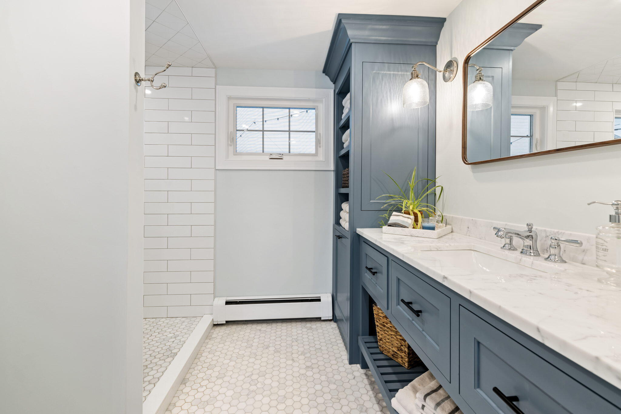 359 Cap'n Lijah's Road Centerville, MA 02632 - Photo 33 of 43 a bathroom with a double vanity sink and a mirror