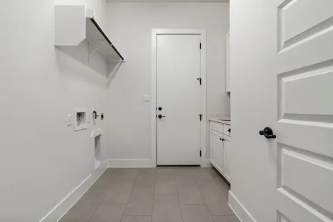 a view of a bathroom with a sink and a shower
