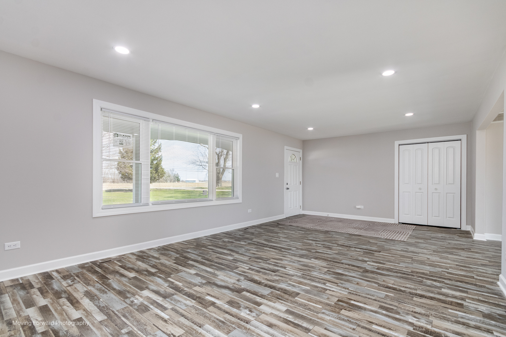 38W715 Huntley Road West Dundee, IL 60118 - Photo 34 of 42 a view of an empty room with wooden floor and a window