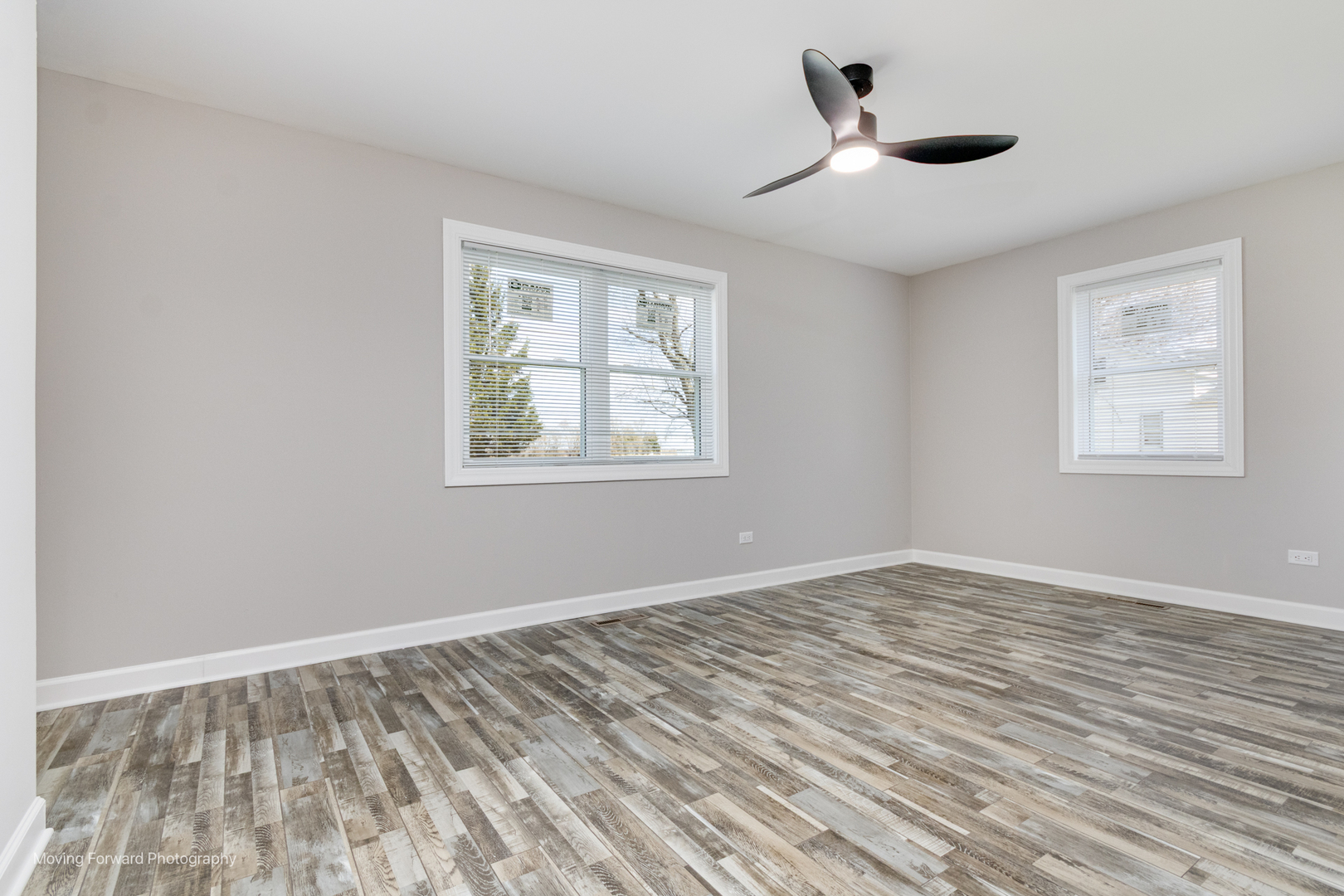 38W715 Huntley Road West Dundee, IL 60118 - Photo 35 of 42 a view of empty room with wooden floor and fan