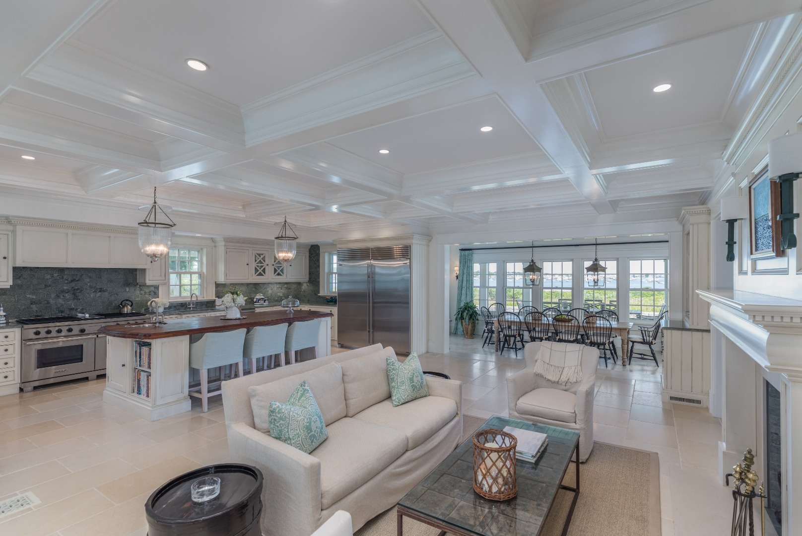 20 Berkeley Avenue Nantucket, MA 02554 - Photo 6 of 30 a living room with furniture a flat screen tv and kitchen view