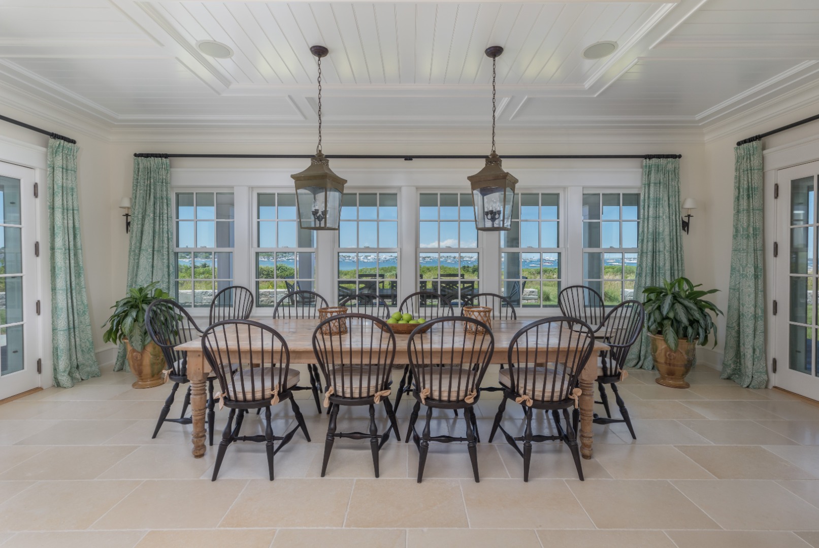 20 Berkeley Avenue Nantucket, MA 02554 - Photo 7 of 30 a view of a dining room and livingroom with furniture wooden floor a chandelier