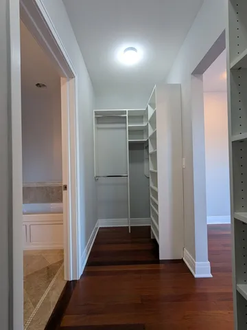 a view of entryway with wooden floor