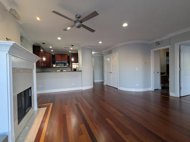 a view of a kitchen with a sink and a stove top oven