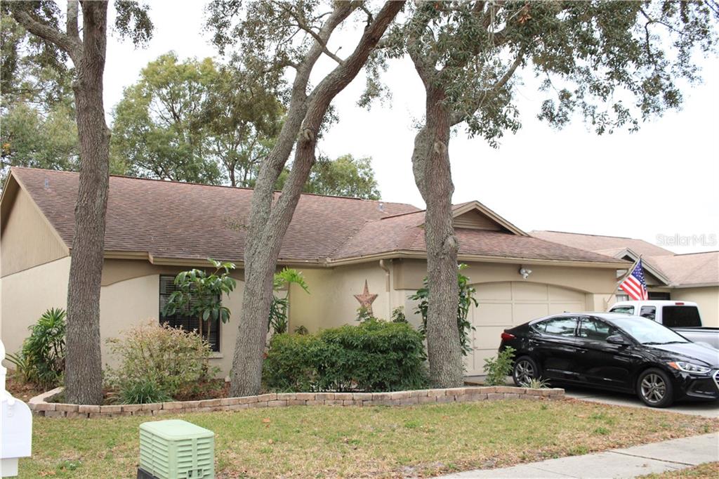 8424 Unity Drive Port Richey, FL 34668 - Photo 1 of 1 Front exterior from street.
