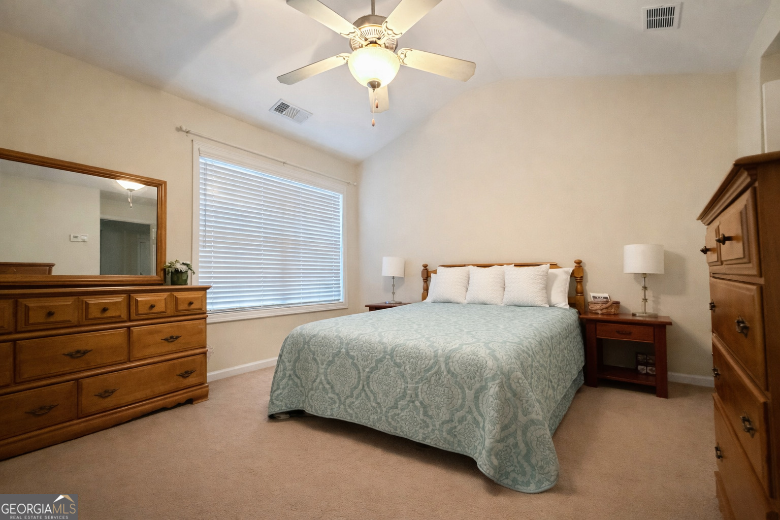 141 C3 Mill Carrollton, GA 30116 - Photo 14 of 27 a bedroom with bed and window