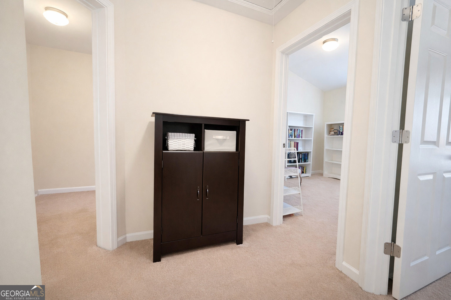 141 C3 Mill Carrollton, GA 30116 - Photo 18 of 27 a view of a hallway with wooden shelves
