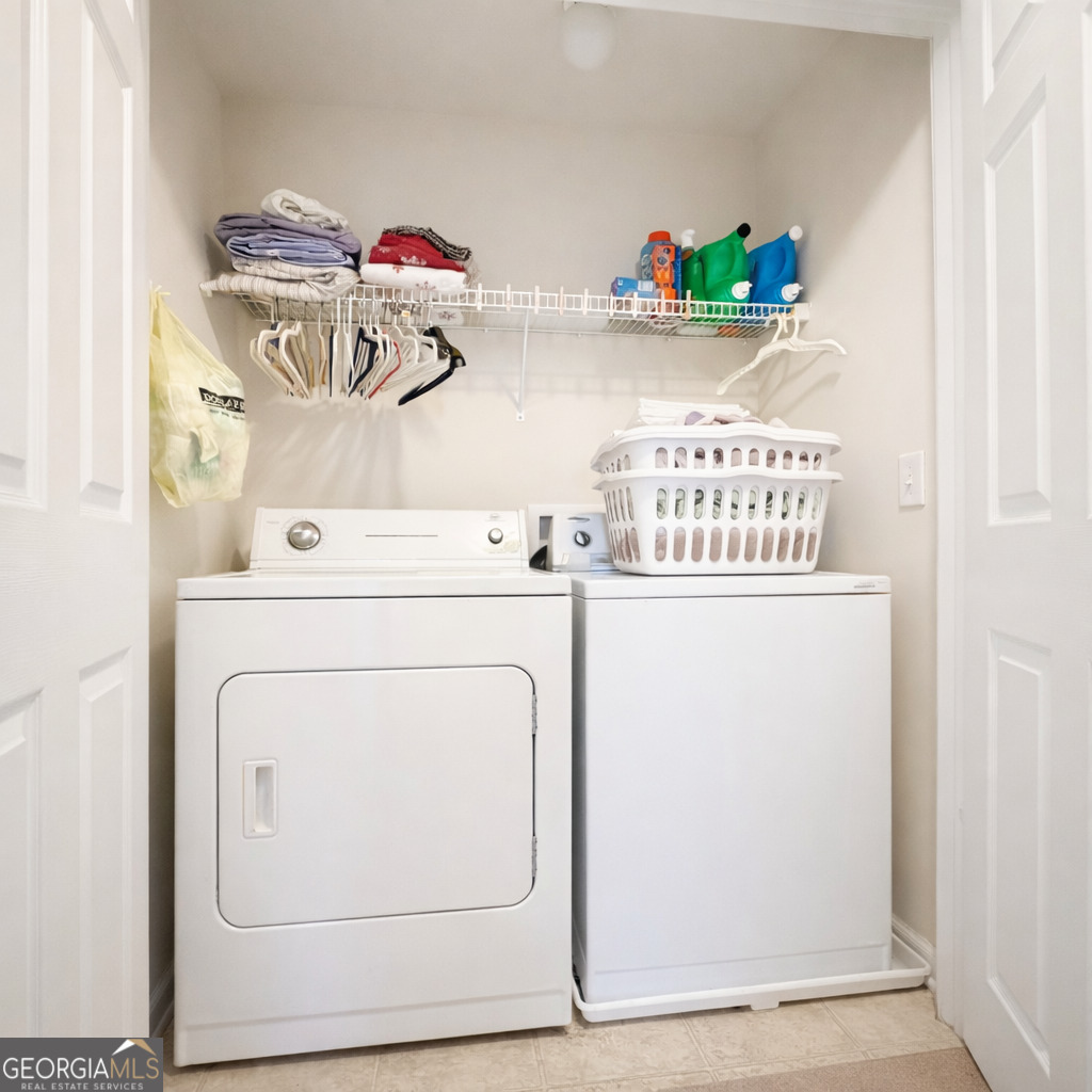 141 C3 Mill Carrollton, GA 30116 - Photo 23 of 27 a utility room with dryer and washer