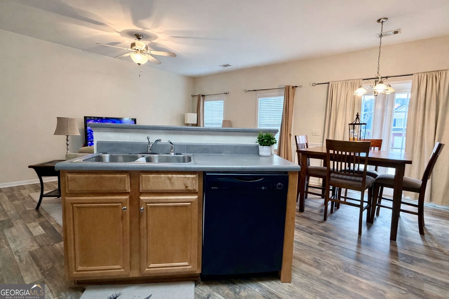 141 C3 Mill Carrollton, GA 30116 - Photo 8 of 27 a dining table with chairs and wooden floor