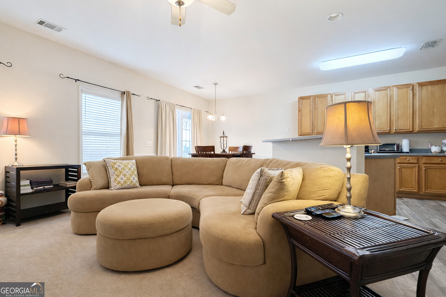 141 C3 Mill Carrollton, GA 30116 - Photo 10 of 27 a living room with furniture and a window