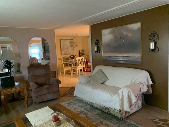 a kitchen with a stove top oven and cabinets