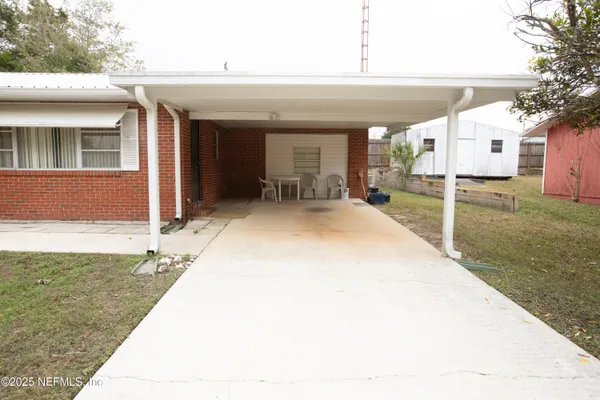 a view of a house with a swimming pool