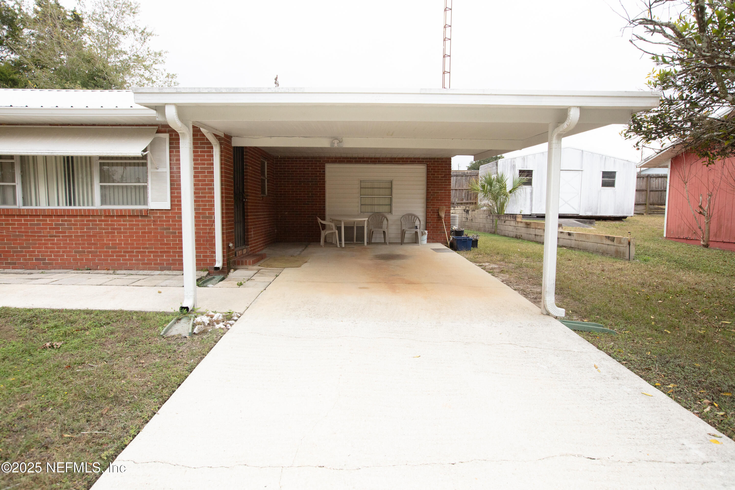 6276 Magnolia Street Keystone Heights, FL 32656 - Photo 18 of 45 a view of a house with a swimming pool
