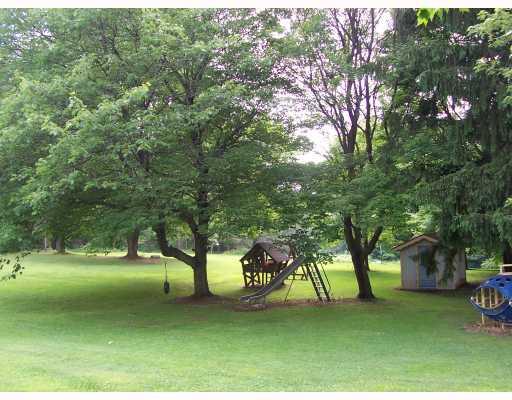 529 Engle Road Ohioville, PA 15052 - Photo 4 of 14 Exterior Back. Beautiful Level Yard Backing to Woods