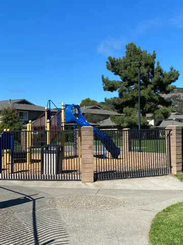 a view of a wrought iron fences in front of house