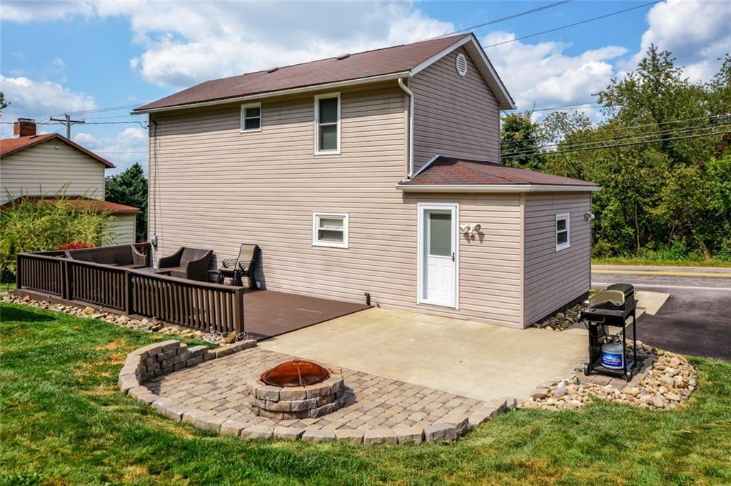 358 Oak Road Gibsonia, PA 15044 - Photo 20 of 22 Rear Yard w/Concrete Pad, Fire Pit & Wood Deck.