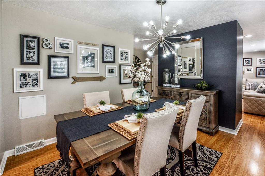 358 Oak Road Gibsonia, PA 15044 - Photo 8 of 22 Dining Room w/ New Eliminate Flooring, Newly Painted & New Window.