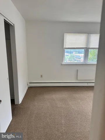 a view of a window in an empty room