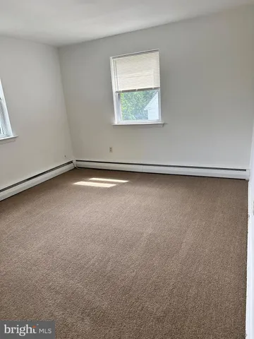 an empty room with a workbench