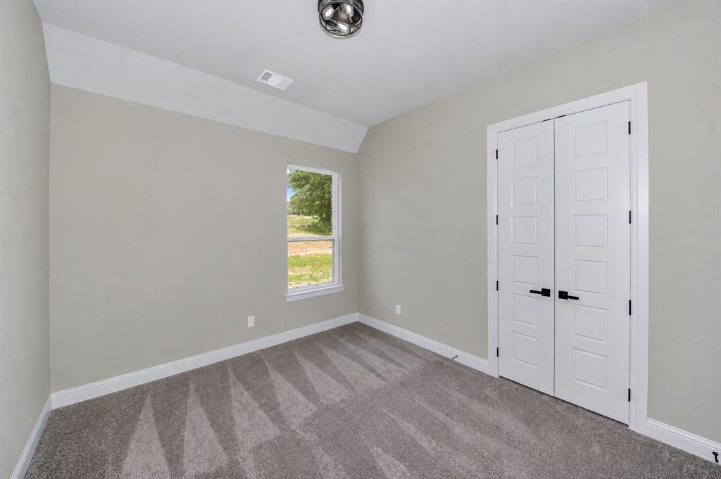 1057 Vh Ranch Poolville, TX 76487 - Photo 26 of 38 a view of an empty room with a window