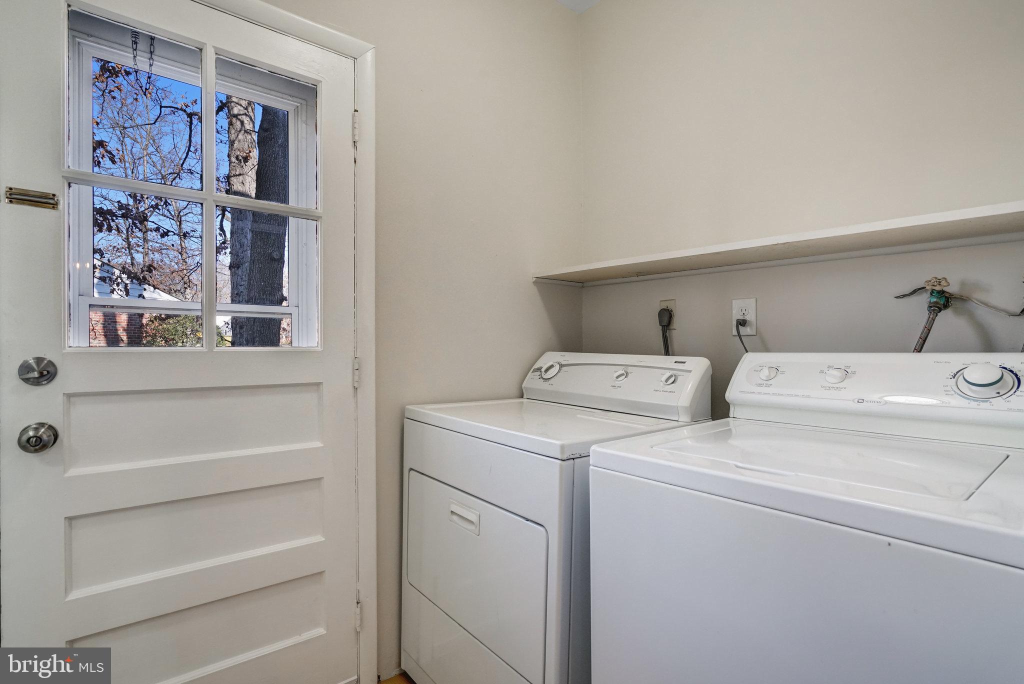 6002 Sherborn Lane Springfield, VA 22152 - Photo 27 of 52 a utility room with dryer and washer