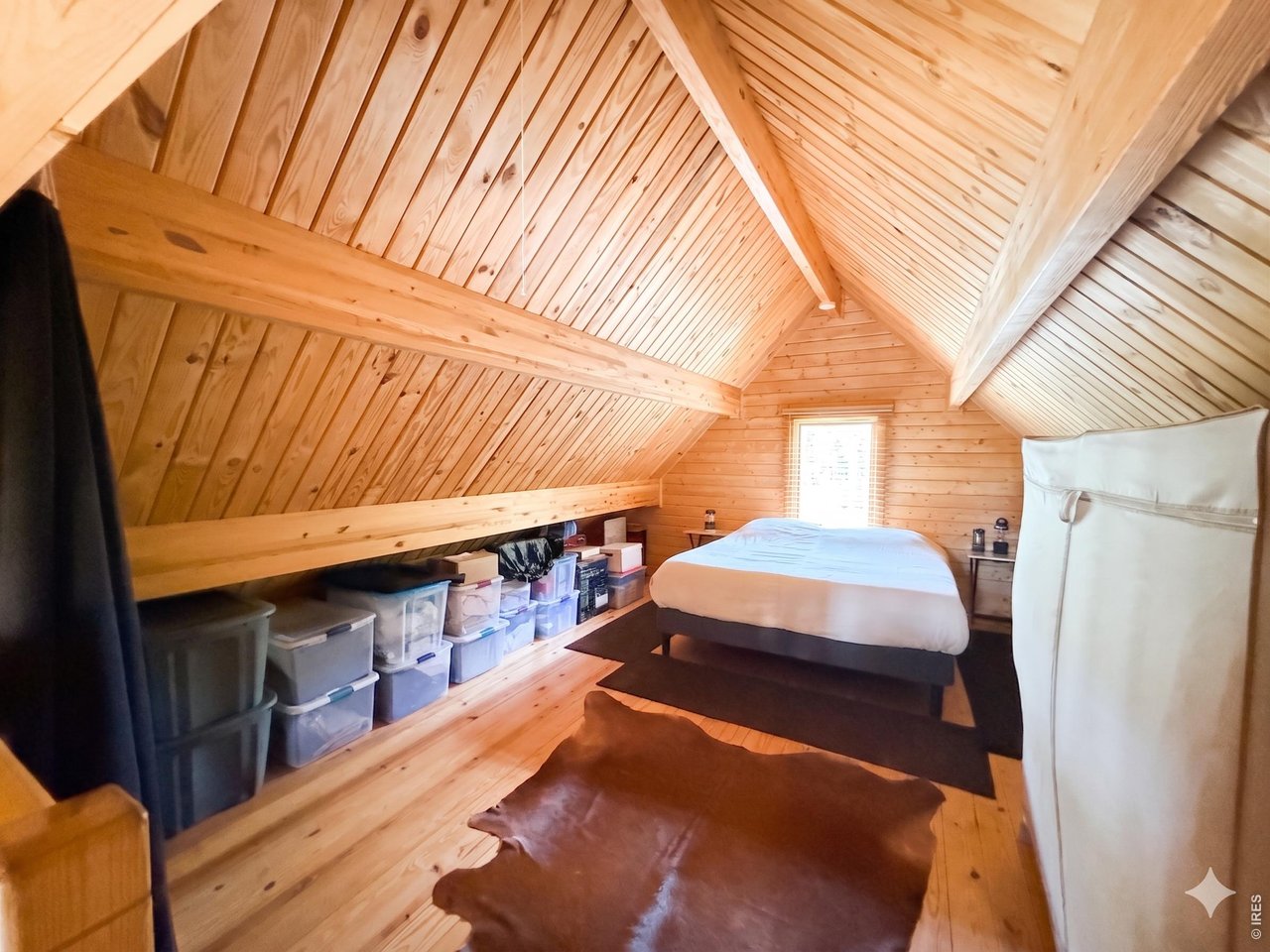 10000 Forest Road, Unit 169 Red Feather Lakes, CO 80545 - Photo 11 of 31 Natural light floods the loft offering a space with views into the great room, and out to the forest beyond.