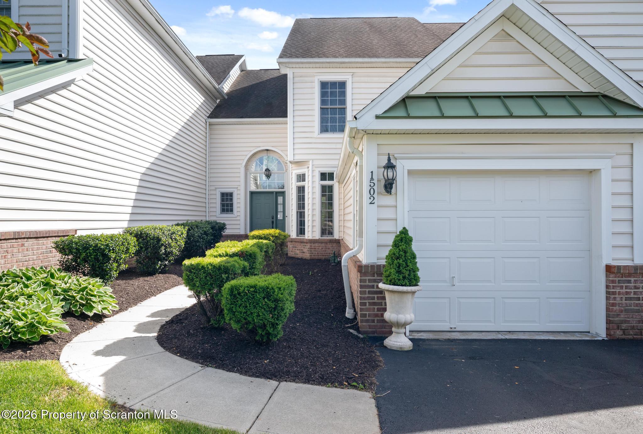 1502 Verne Cl Moosic, PA 18507 - Photo 46 of 46 a front view of a house with garden