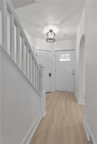 a view of a hallway with entryway