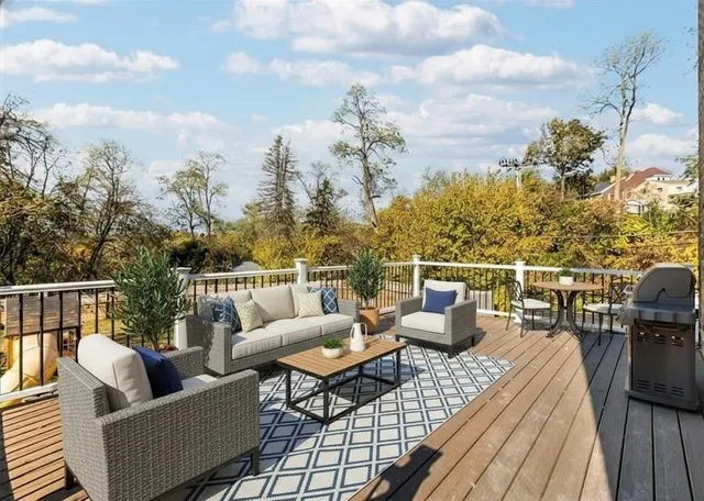 a view of roof deck with seating space