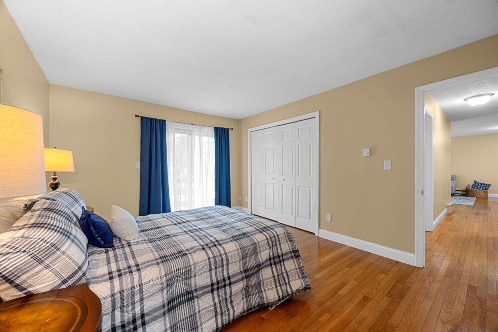 800 Bearses Way, Unit 1WD Hyannis, MA 02601 - Photo 12 of 24 a bedroom with a bed and a window