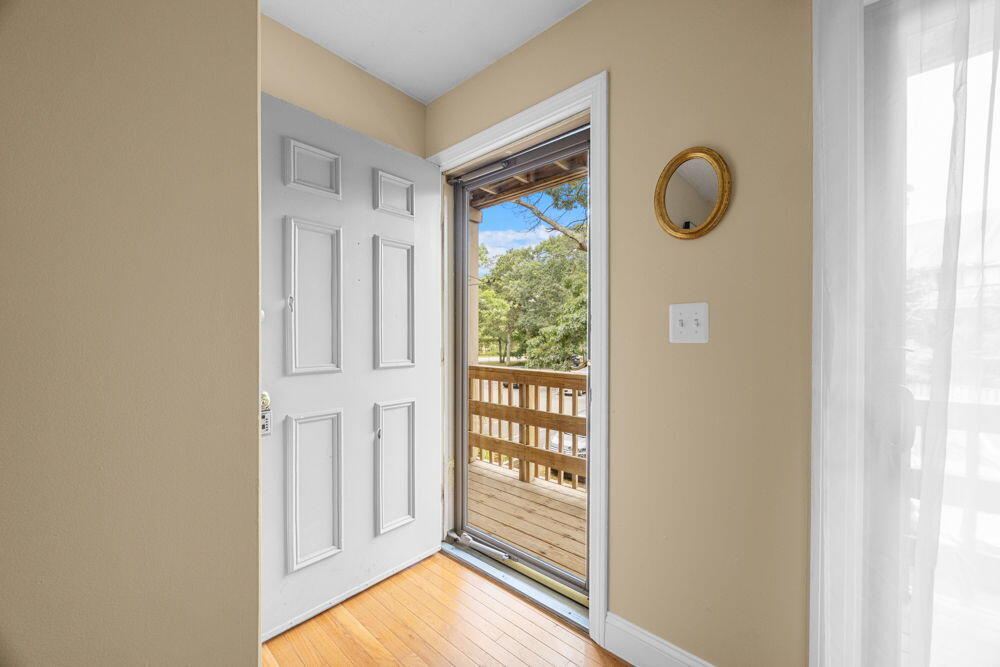 800 Bearses Way, Unit 1WD Hyannis, MA 02601 - Photo 18 of 24 a view of a hallway with windows