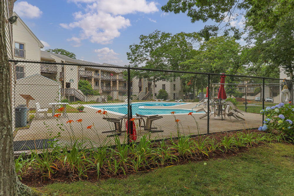 800 Bearses Way, Unit 1WD Hyannis, MA 02601 - Photo 22 of 24 a view of a park with swings and slides