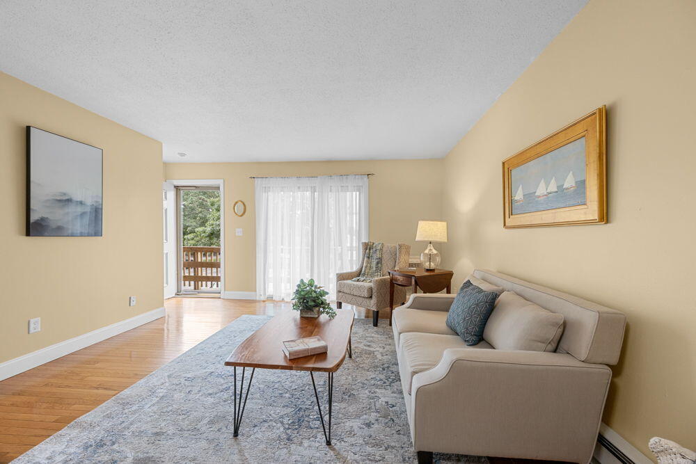 800 Bearses Way, Unit 1WD Hyannis, MA 02601 - Photo 3 of 24 a living room with furniture and a window