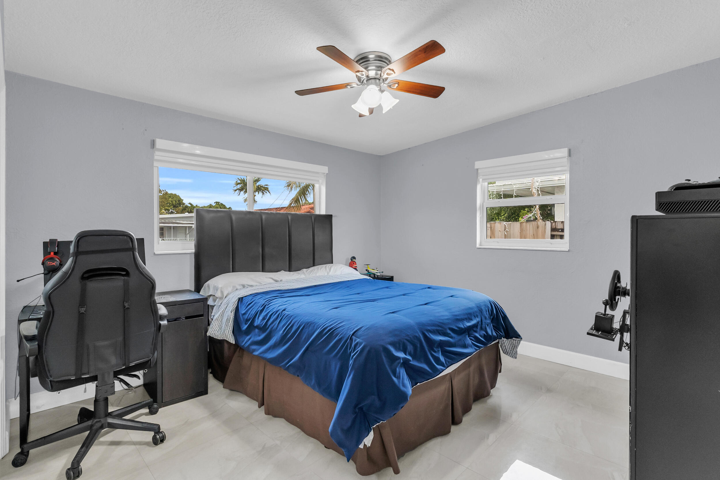 6350 Southwest 32nd Street Miami, FL 33155 - Photo 22 of 34 a bedroom with a bed and a desk