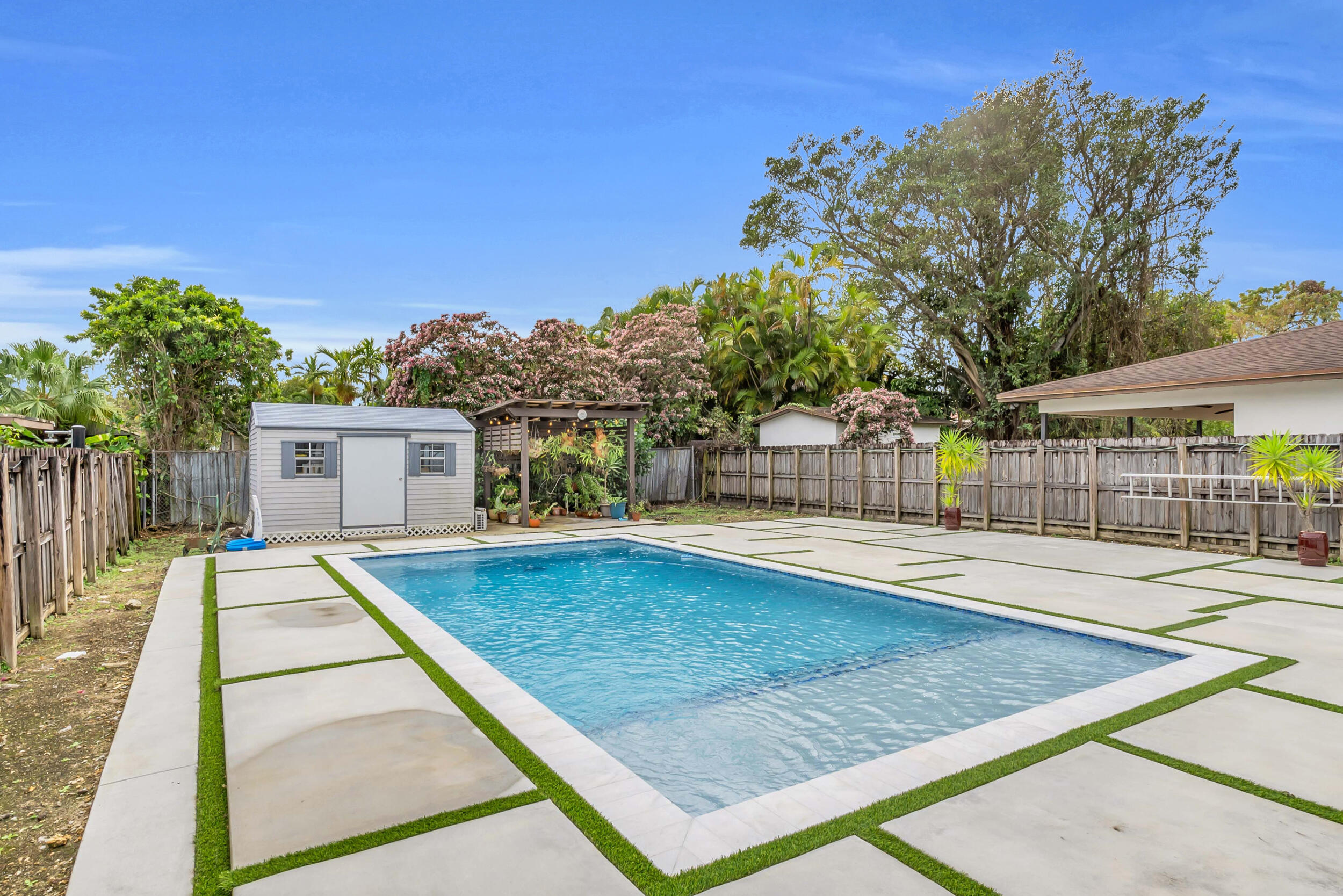 6350 Southwest 32nd Street Miami, FL 33155 - Photo 33 of 34 a view of a house with swimming pool