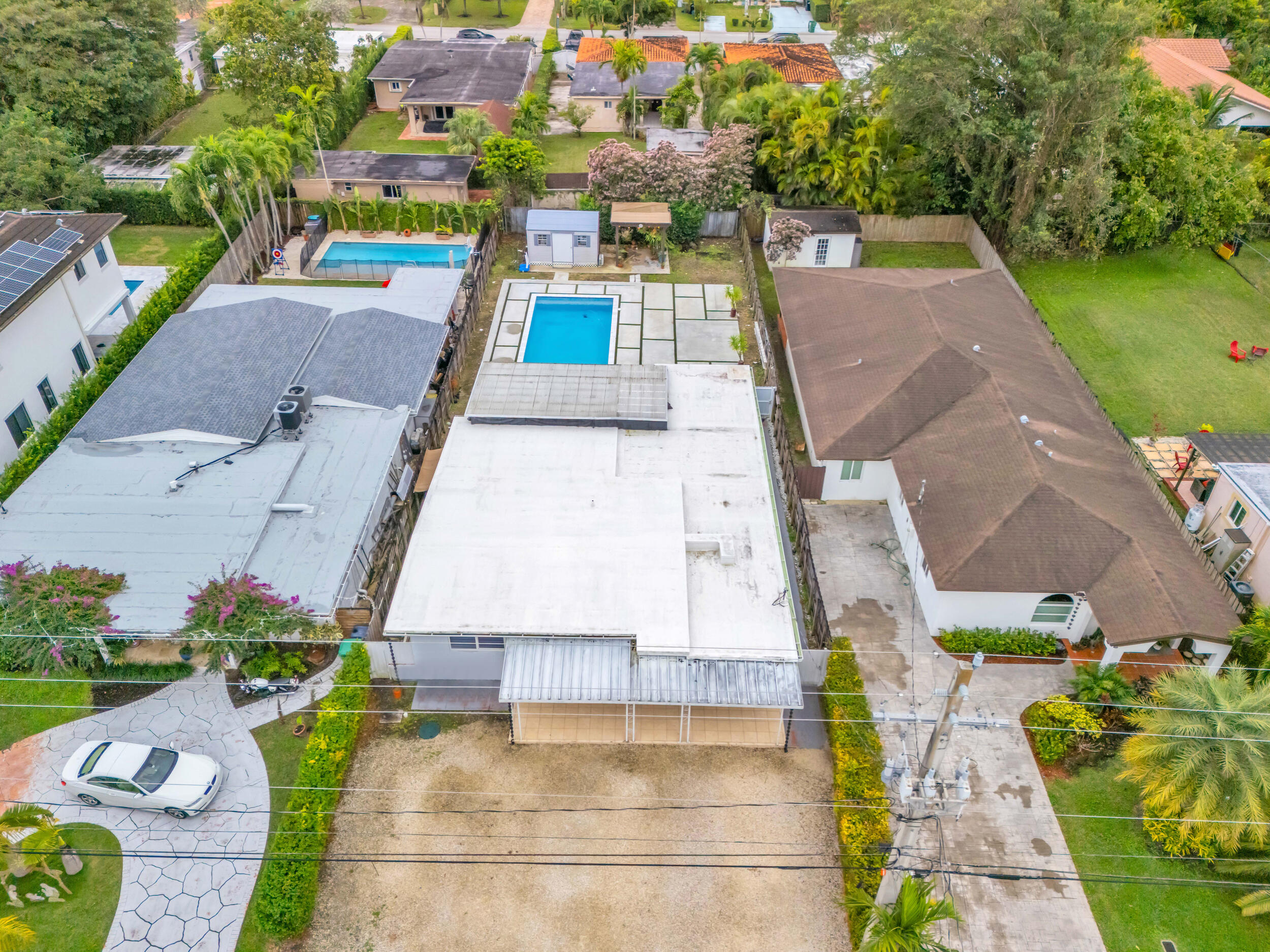 6350 Southwest 32nd Street Miami, FL 33155 - Photo 5 of 34 an aerial view of a house with swimming pool and garden view