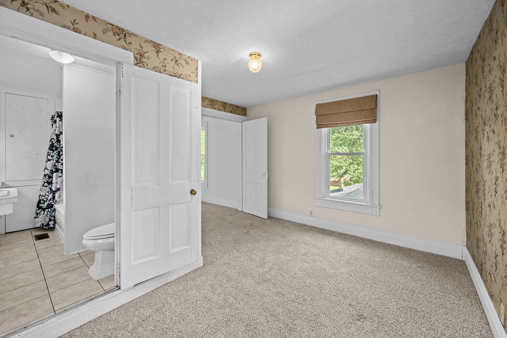 802 North High Street Port Byron, IL 61275 - Photo 30 of 43 a view of an empty room with a window