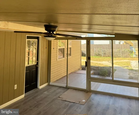 a view of a room with a large window